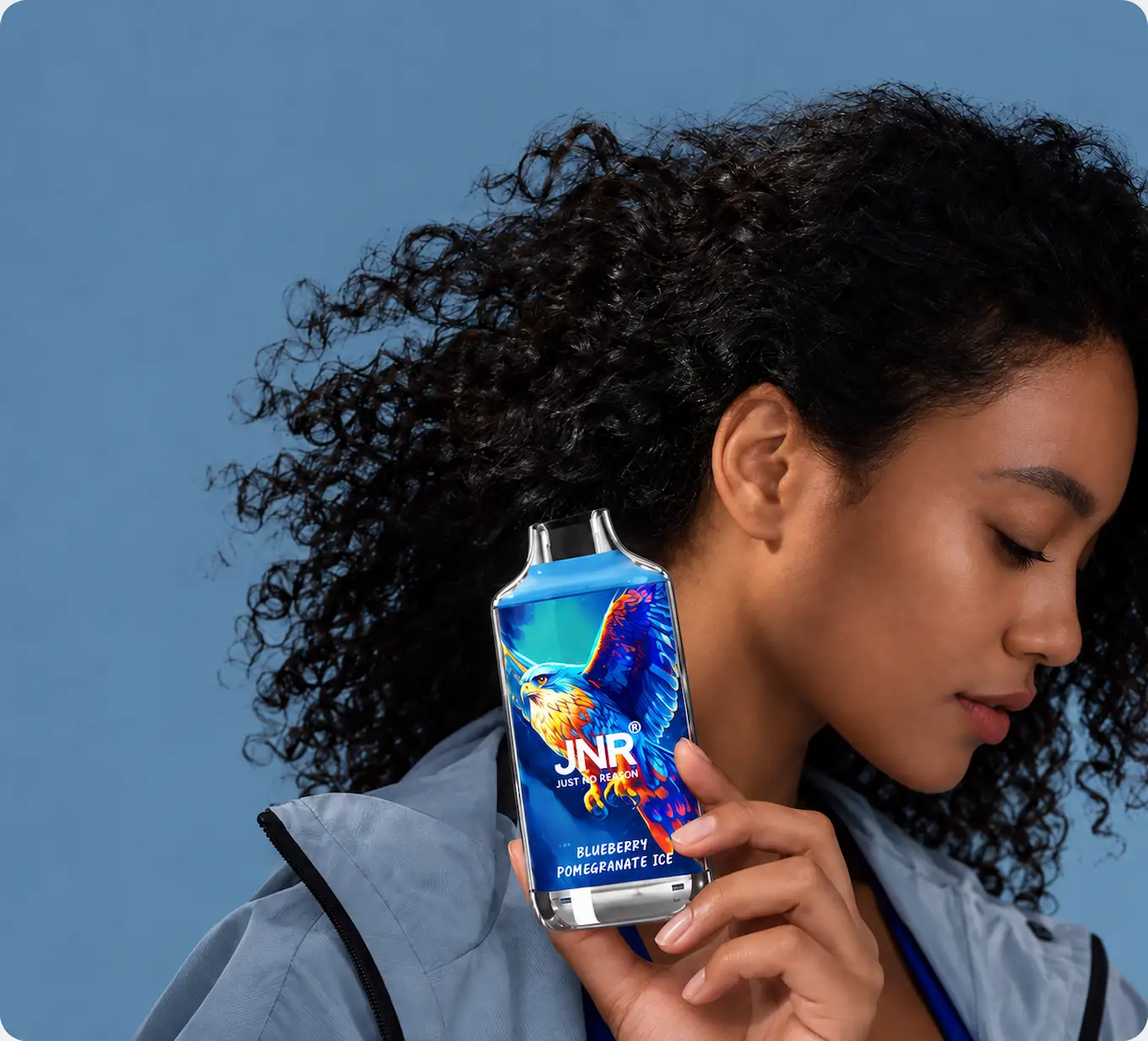 JNR Falcon Blueberry Pomegranate Ice vape with vibrant blue eagle artwork.